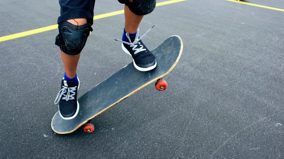 person on skateboard at daytime